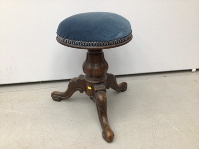 Lot 24 - Victorian mahogany piano stool with blue upholstered seat on tripod base and a tiled top table and another piano stool (3)