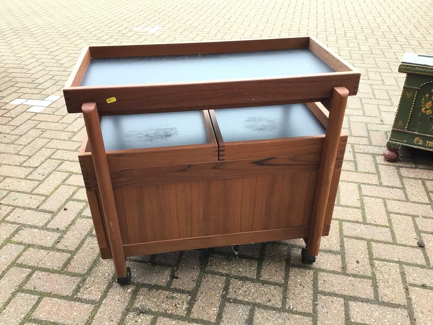 Lot 69 - Mid century teak drinks trolley with removable tray top, two pull out slides enclosing bottle holders 80cm wide x 50cm deep x 73cm high