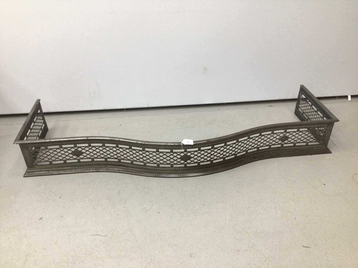 Lot 76 - Victorian steel serpentine fronted fender 138cm wide