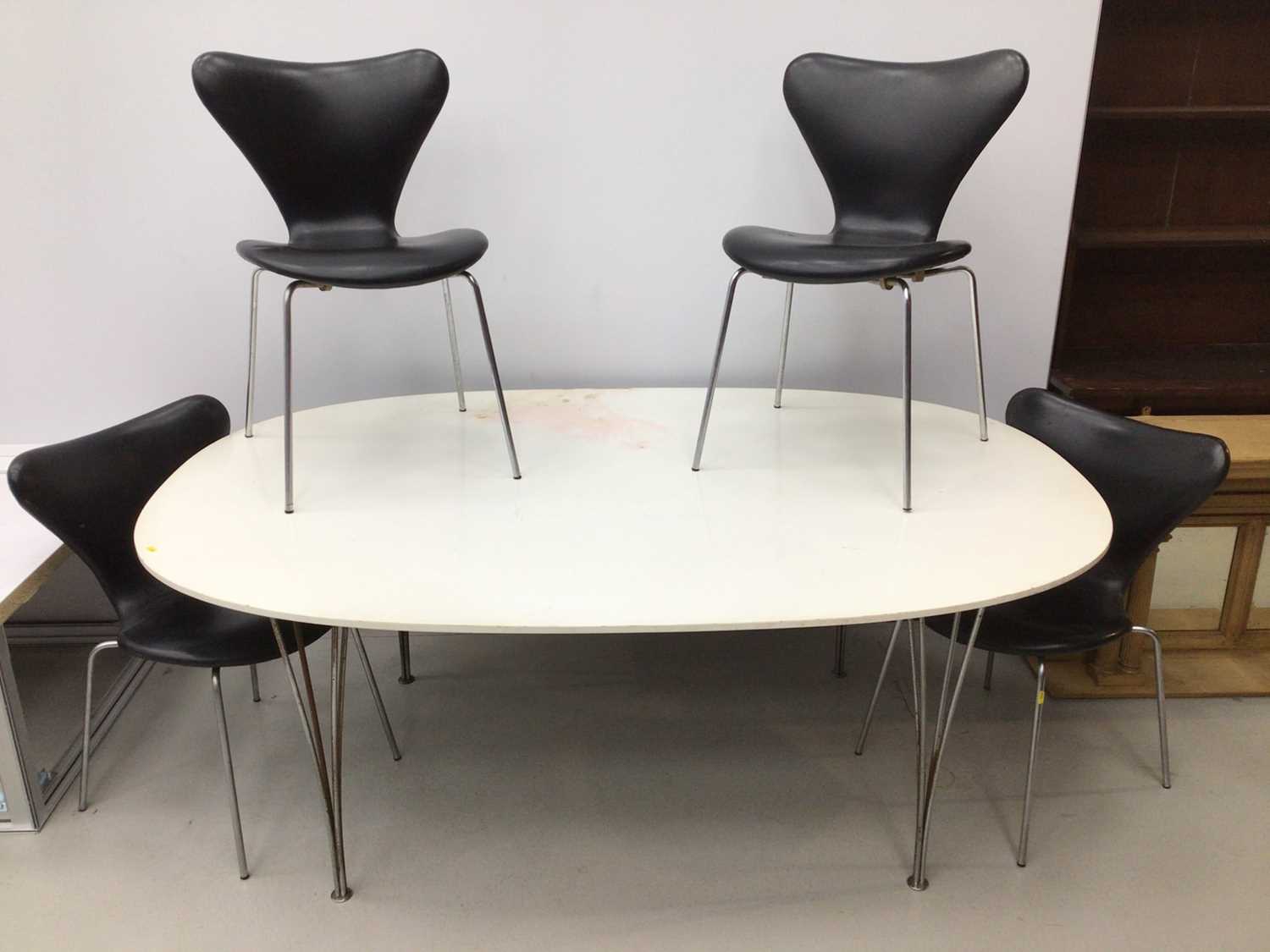 Lot 77 - Fritz Hansen large dining table by Piet Hein on chrome legs 180cm x 122cm with a set of four Fritz Hansen chairs