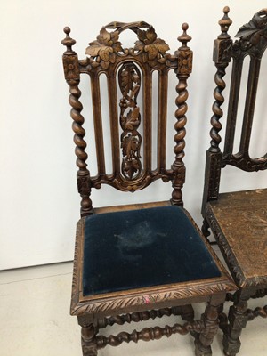 Lot 32 - Two Victorian carved oak chairs with spiral twist supports