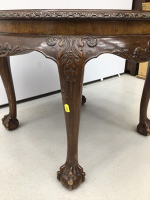 Lot 33 - walnut veneered circular coffee table, Edwardian mahogany tow tier table and an oak revolving bookcase (3)