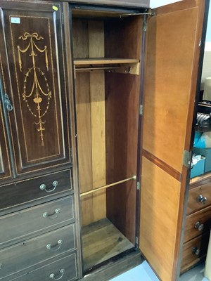 Lot 82 - Edwardian inlaid mahogany wardrobe with two central panelled doors and four draws below flanked by two bevelled mirrored doors 193.5cm wide x 203cm high