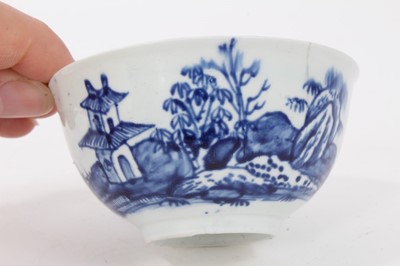 Lot 177 - Vauxhall blue and white tea bowl and saucer, c.1755, decorated with an Oriental island pattern, the saucer measuring 12cm diameter
