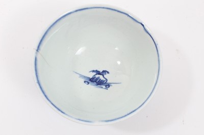 Lot 177 - Vauxhall blue and white tea bowl and saucer, c.1755, decorated with an Oriental island pattern, the saucer measuring 12cm diameter