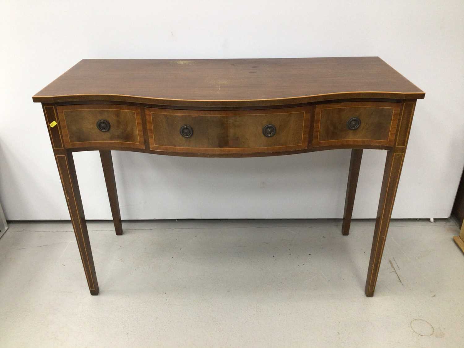 Lot 93 - Georgian style inlaid mahogany serpentine fronted serving table with three drawers on square taper legs, 122.5cm wide, 49cm deep, 87.5cm high