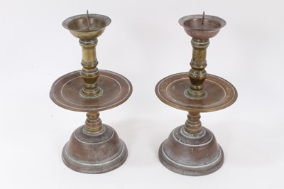 Lot 832 - A pair of 17th / 18th century Dutch bronze pricket candlesticks