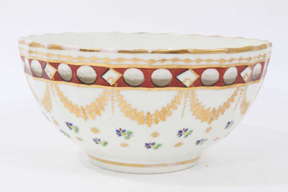 Lot 180 - Pinxton porcelain bowl, c.1800, of round faceted form, decorated in enamels and gilt with swags and floral sprays, 16cm diameter