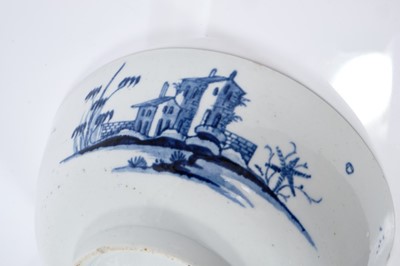 Lot 181 - Rare Longton Hall bowl, c.1754-56, the exterior painted in underglaze blue with a 'Long Eliza' type figure, the reverse and interior with European buildings, workman's mark inside the footrim, 19...