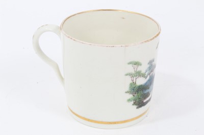 Lot 183 - Pinxton coffee can, c.1800, polychrome painted with a landscape scene, with gilt banding, 6.25cm high