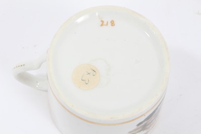 Lot 183 - Pinxton coffee can, c.1800, polychrome painted with a landscape scene, with gilt banding, 6.25cm high