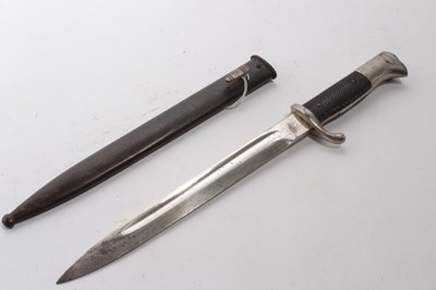 Lot 976 - Second World War Nazi German KS98 bayonet with polished steel blade by A. Betz Giessen, cherquered plastic grip and plated fittings, in black steel scabbard