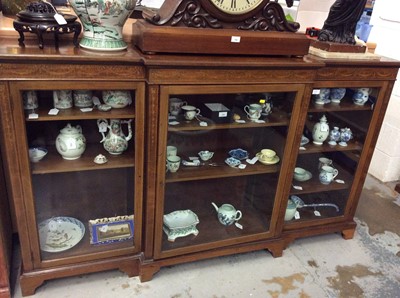 Lot 1497 - Good quality Edwardian inlaid mahogany breakfront bookcase with inlaid swags, ribbons and festoons, adjustable shelves enclosed by three glazed doors, retailer's label Bruce & Co, Baker Street, Lon...