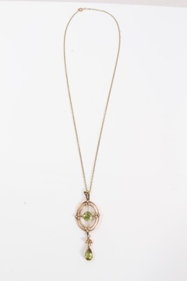 Lot 102 - Edwardian 15ct gold peridot and seed pearl pendant on chain
