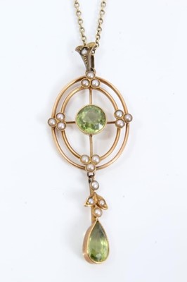 Lot 102 - Edwardian 15ct gold peridot and seed pearl pendant on chain
