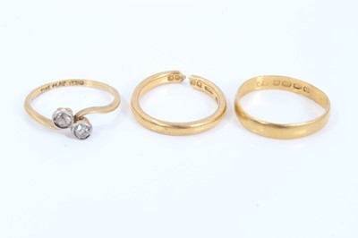 Lot 107 - Two 22ct gold wedding rings and 18ct gold two stone diamond crossover ring (3)