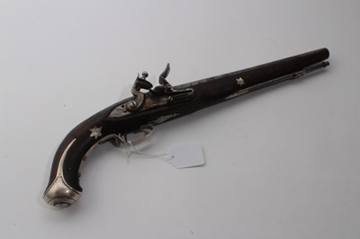 Lot 988 - 19th century Turkish flint lock holster pistol with silver fittings (hallmarked under trigger guard) and silver inlaid demascus barrells, lock plate signed, 44cm overall