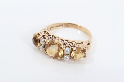 Lot 113 - 9ct gold citrine and seed pearl ring in pierced scroll setting and 9ct gold pearl and red stone ring