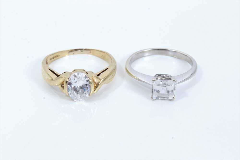 Lot 115 - Two 9ct gold synthetic stone solitaire rings