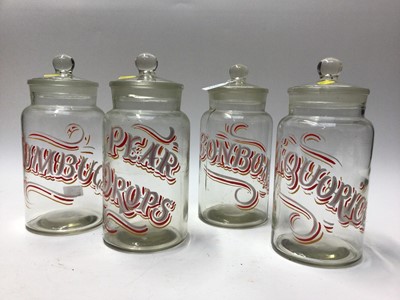 Lot 2279 - Set of four 1950s Confectioners Shop Jars, with painting naming for 'Pear Drops', 'Bonbons', 'Humbugs' and 'Liquorice'