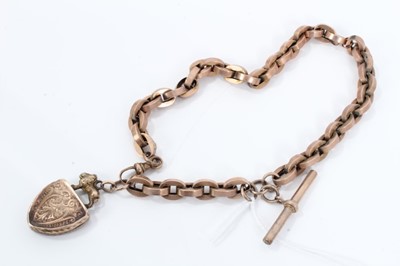 Lot 121 - Victorian 9ct rose gold watch chain with shield shaped locket fob