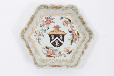 Lot 197 - 18th century Chinese famille rose armorial teapot stand, the centre painted with the armorial, surrounded by floral sprays and gilt patterns, 14cm across