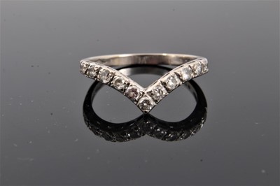 Lot 124 - 18ct white gold diamond half eternity wishbone ring
