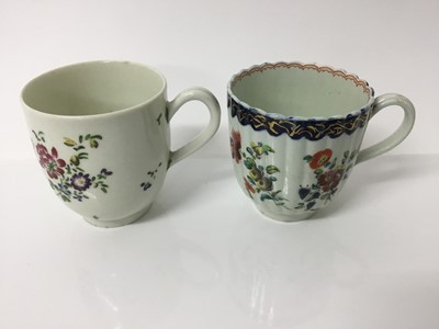Lot 202 - Liverpool coffee cup of fluted form, polychrome decorated with floral sprays, 6.5cm high, together with a Worcester painted coffee cup, 6.5cm high (2)