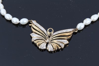 Lot 126 - Cultured pearl necklace with 9ct gold sapphire and diamond set butterfly pendant