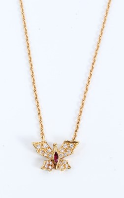 Lot 127 - 18ct gold diamond and ruby butterfly pendant on chain
