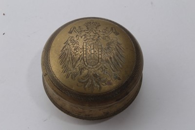 Lot 682 - First World War period Imperial Austrian brass snuff box of circular form, with engraved Habsburg Eagle coat of arms to top, 6cm in diameter