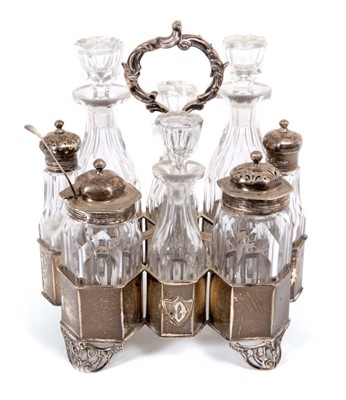 Lot 485 - Victorian eight bottle cruet set, with matching silver mounted and cut glass bottles