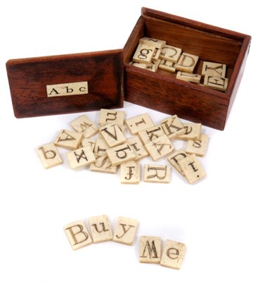 Lot 834 - Rare early 19th century child's boxed set of carved bone alphabet tiles