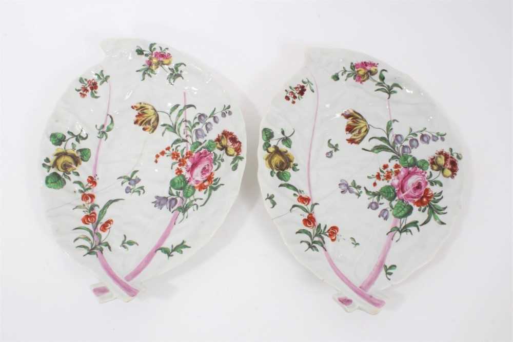 Lot 207 - Pair of Worcester cabbage leaf dishes, c.1760-65, painted in the Rogers style with floral sprays, 26cm across
