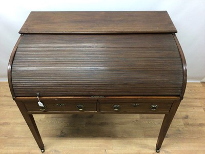 Lot 945 - Late 19th / early 20th century mahogany roll top desk