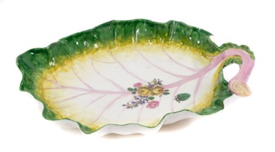 Lot 211 - Chelsea cabbage-leaf-shaped dish, c.1756, polychrome painted with naturalistic details and a floral spray, 24cm long