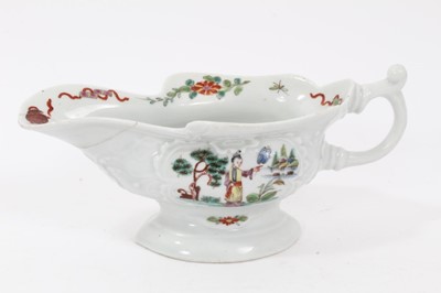 Lot 213 - Worcester sauceboat, c.1755, of shaped form on a pedestal base, polychrome decorated with Chinese figures within moulded cartouches, floral sprays and precious objects inside the rim, 17cm long
