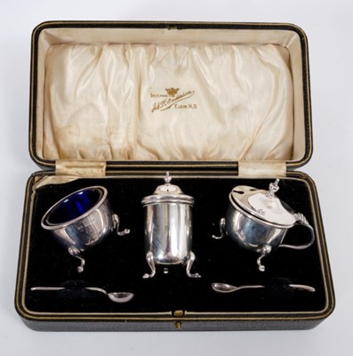 Lot 488 - 1920s silver three piece condiment set of cauldron form