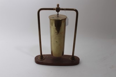 Lot 708 - Brass 'Trench Art' Dinner Gong constructed from a shell, supported on brass frame, 42cm in overall height