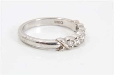 Lot 129 - Platinum diamond five stone half eternity ring