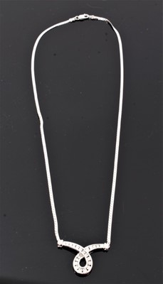 Lot 131 - 9ct white gold diamond set loop pendant necklace