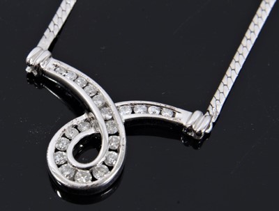 Lot 131 - 9ct white gold diamond set loop pendant necklace