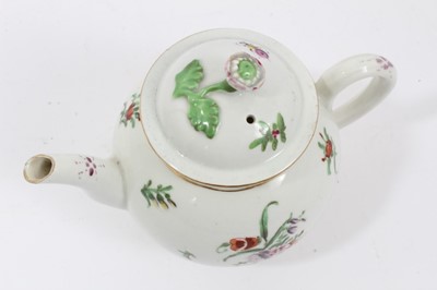 Lot 216 - Worcester teapot and cover, c.1770, polychrome decorated with floral sprays, flower finial to cover, 13cm high
