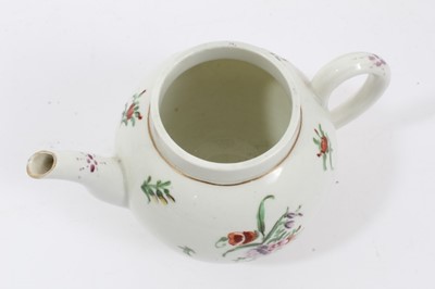 Lot 216 - Worcester teapot and cover, c.1770, polychrome decorated with floral sprays, flower finial to cover, 13cm high