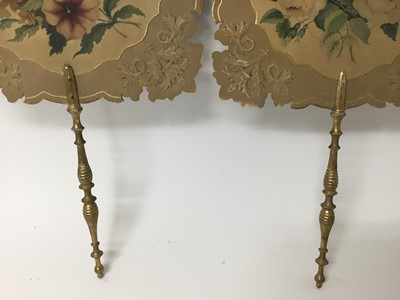 Lot 131 - Pair of early 19th century face screens, each with turned giltwood handle