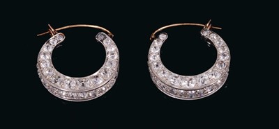 Lot 528 - Pair of diamond hoop earrings, each with a double-sided hoop of pavé set old cut diamonds in white gold setting. Estimated total diamond weight approximately 6.5cts. Diameter of each hoop approxima...