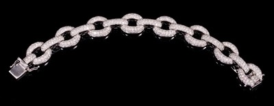 Lot 536 - Diamond and 18ct white gold bracelet with large pavé set diamond chain links, estimated total diamond weight approximately 7.5cts. Length approximately 18cm.