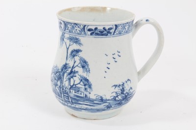 Lot 228 - Bow blue and white baluster shaped mug, c.1755, decorated in the chinoiserie style, painter's mark to base, 9cm high