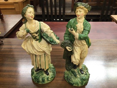 Lot 536 - Pair of painted plaster figures