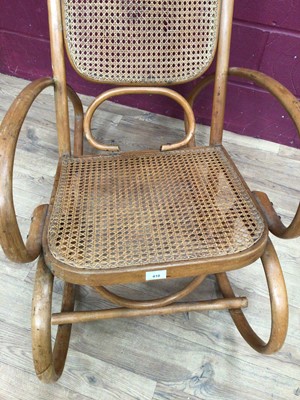 Lot 410 - Bentwood rocking chair and a mahogany wall cabinet (2)